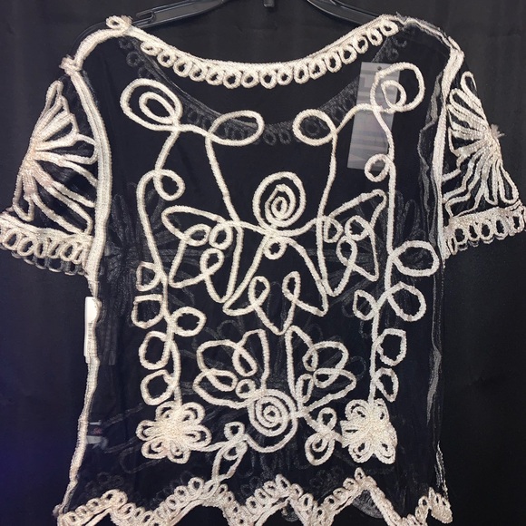 Selling a black cute blouse for women, brand is Michel Fashion size small! - Picture 2 of 4